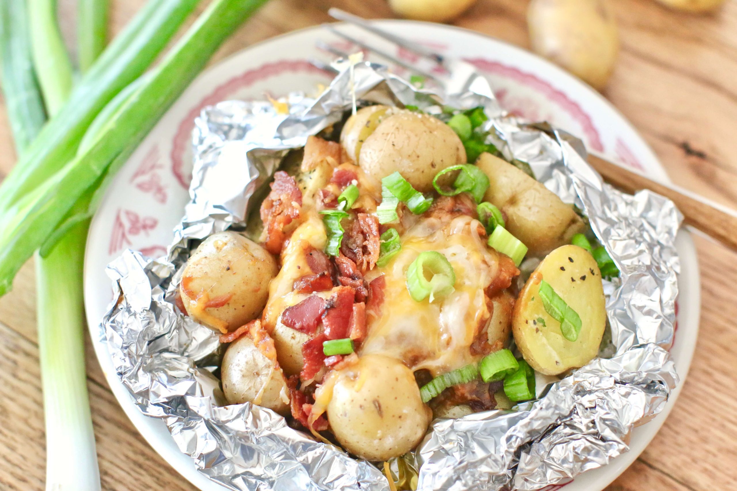 Campfire barbecue pork potato foil packets.