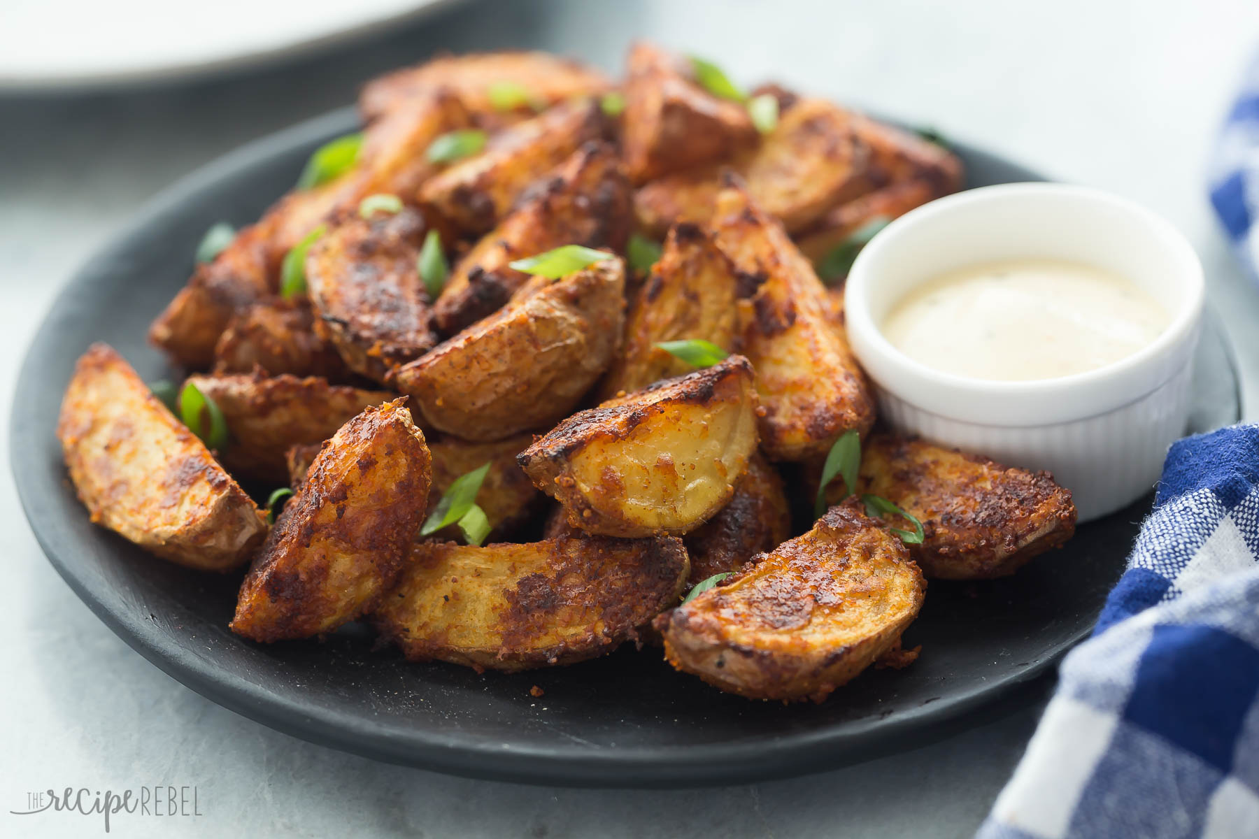 A plate of chipotle Parmesan potato wedges.
