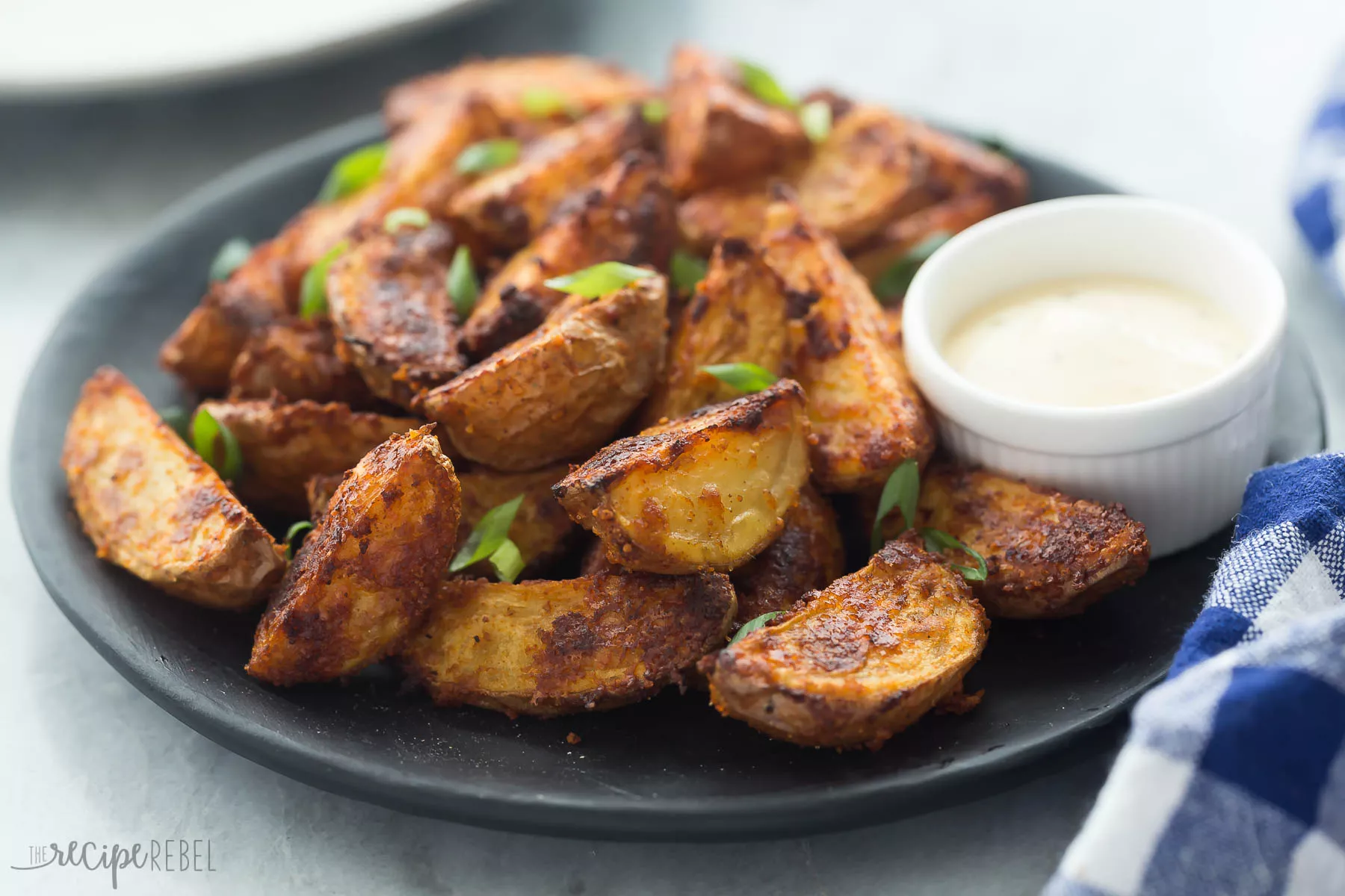 A plate of chipotle Parmesan potato wedges.