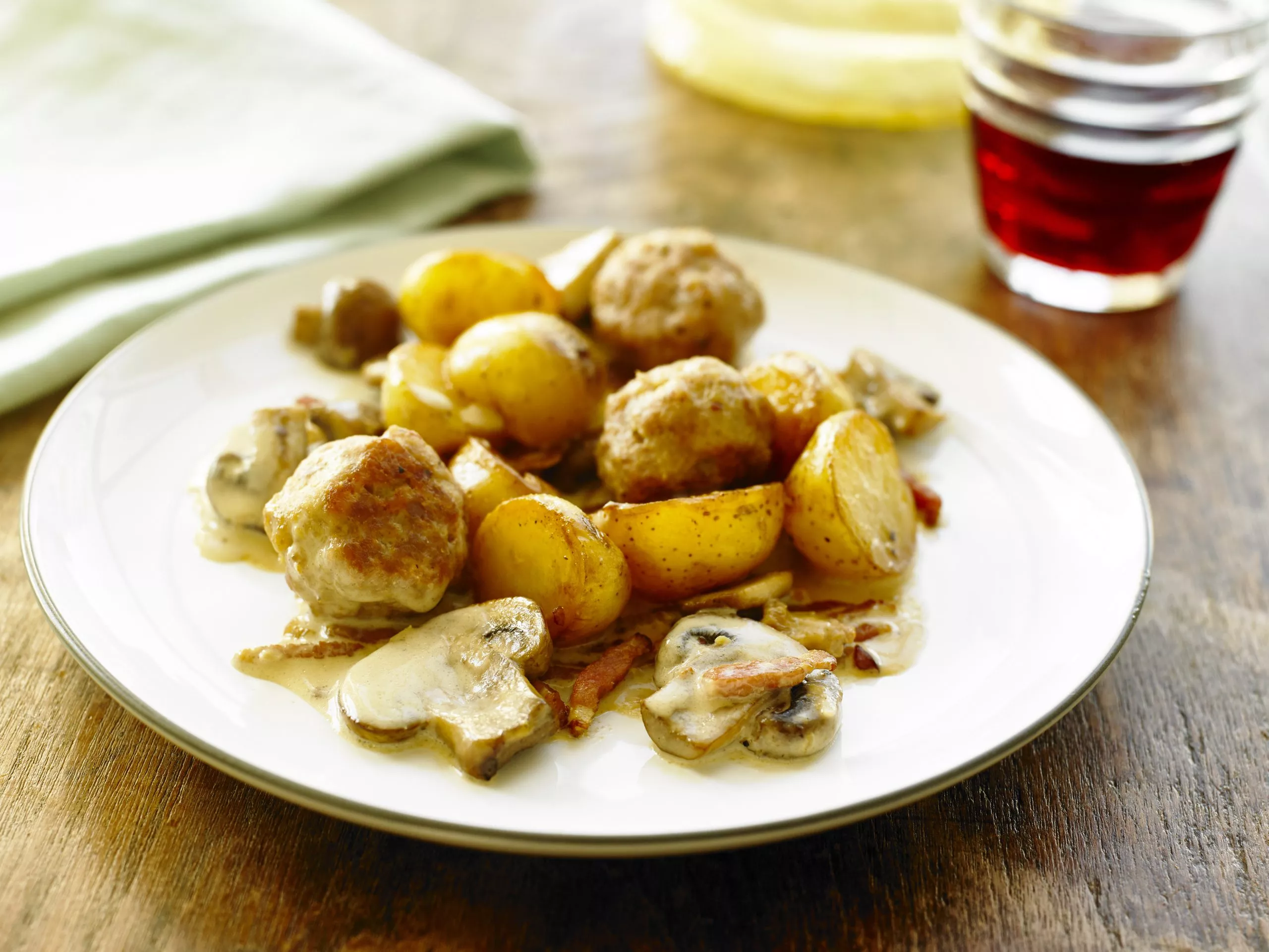 Mushroom potato casserole with meatballs.