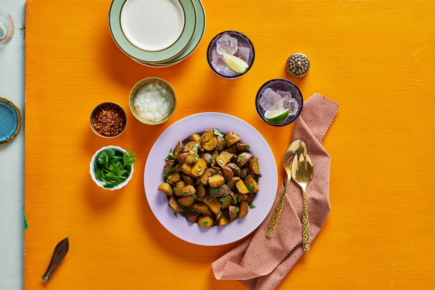A bowl of garam masala and curry pan-fried potatoes.