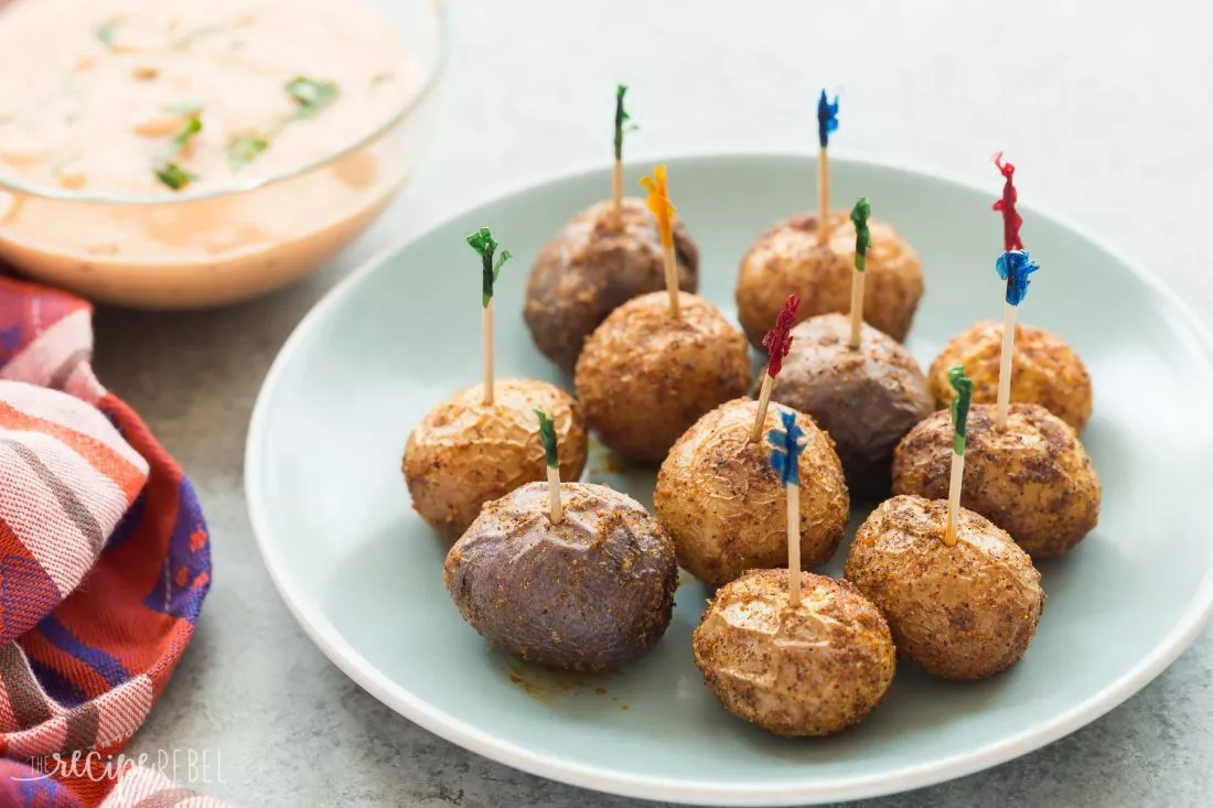 Roasted Little Potatoes with toothpicks in them.