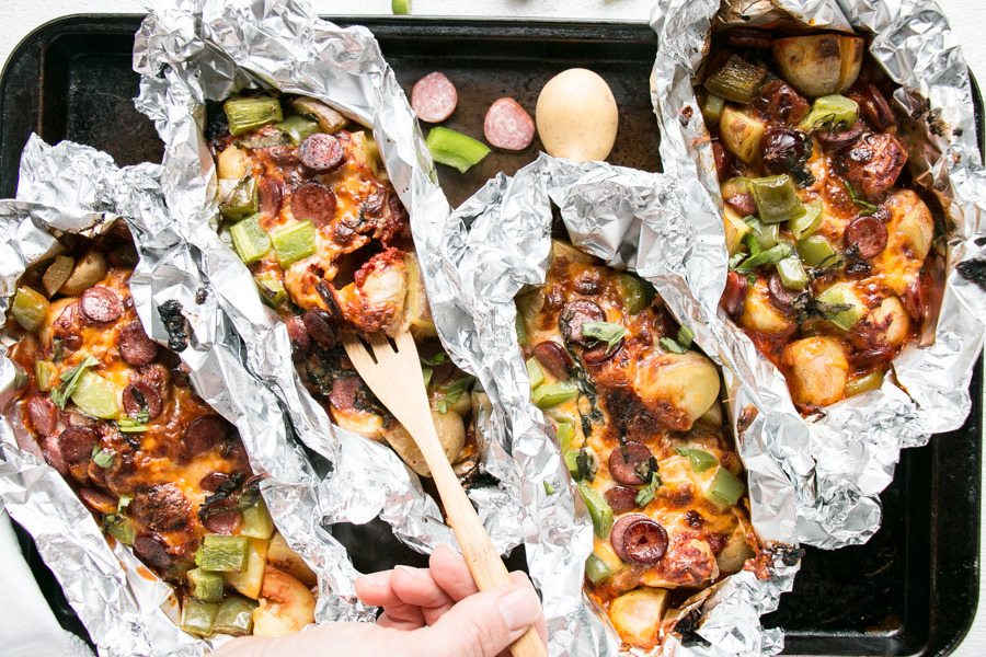 Foil packets full of pizza potatoes.