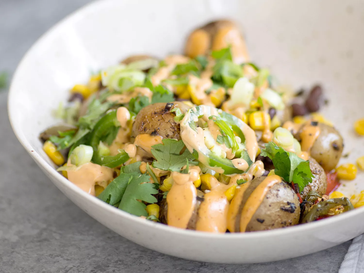 A nacho bowl with potatoes.